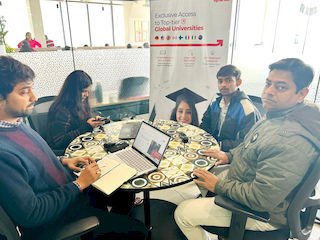 upGrad Indore Office - student and parents with the counselling team after their study abroad session